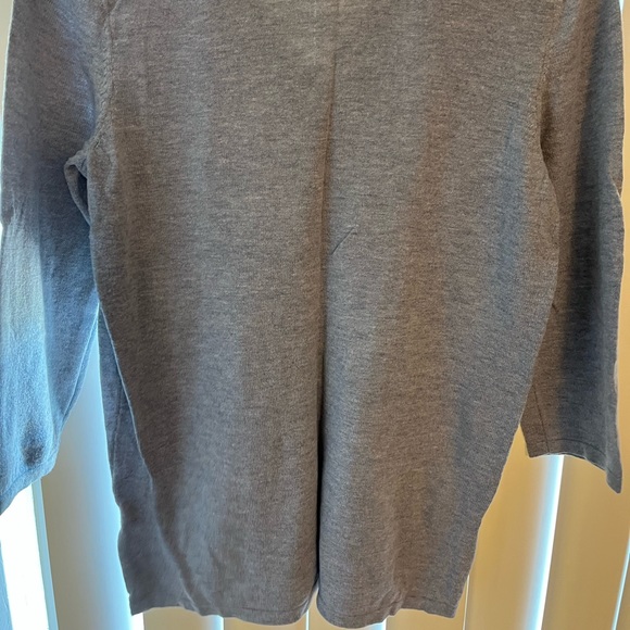 Gray shirt, it is longer. Has been worn a few times. - Picture 2 of 2